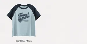 Detail of blue raglan sleeve cotton T-shirt showing Travel Relax print and fabric texture