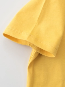 Ginger yellow cotton knit t-shirt for girls featuring high-quality sleeve stitching details