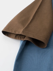 Kids short sleeve cotton T-shirt featuring raglan sleeves and contrast stitching detail