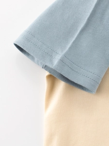Kids short sleeve T-shirt with light blue and yellow contrast stitching detail