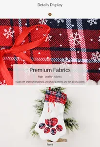 Detail of paw-shaped Christmas stocking with plaid patterns and bone ornament decor