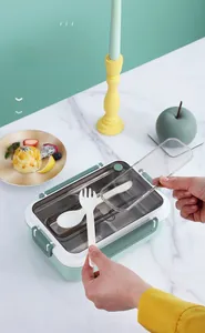 Top view of divided 304 stainless steel bento box with built-in cutlery storage