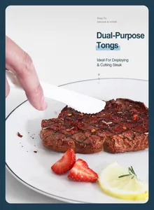 Close-up of white detachable multi-functional spoon and knife cutting a juicy steak