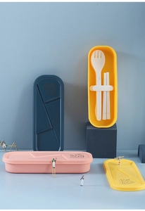 Detailed view of portable matte cutlery sets in blue, pink, and yellow with storage cases