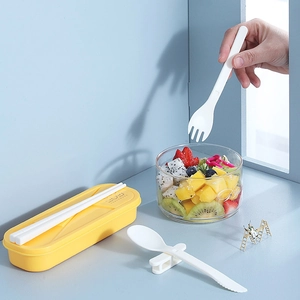 Portable plastic travel cutlery set with yellow storage box for camping or school lunches