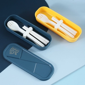 Portable plastic travel cutlery set including chopsticks and spoon in a stylish storage box
