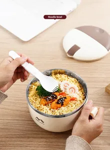Close-up of double-layer stainless steel noodle bowl with foldable spoon and lid