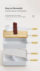 Detailed view showing layers of the double-layer lunch box with bamboo lid and cutlery