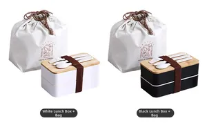 Double-layer bento boxes with bamboo lids, utensils, and drawstring food storage bags