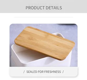 Detailed view of natural bamboo lid with secure sealing silicone ring on white lunch box