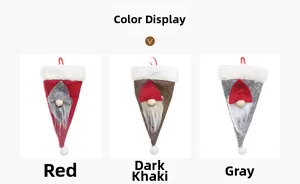 Detalle de tres portacubiertos navideños de gnomos nórdicos en rojo, caqui y gris fieltro
