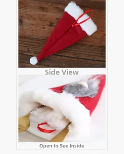 Detalle de porta cubiertos navideño de gnomo con gorro rojo de felpa y barba blanca suave
