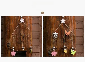 Close-up of Easter wooden signs with Hello Spring letters and floral ornaments