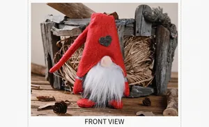 Detail of red Christmas gnome with heart hat among pine cones and rustic wood background