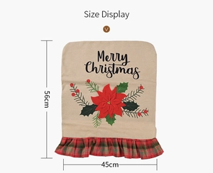 Detail view of 56x45cm Christmas chair cover with Merry Christmas text and red flower