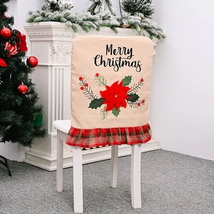 Christmas chair cover with red poinsettia and Merry Christmas text on burlap fabric