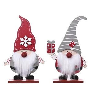 Pair of festive wooden Christmas gnome ornaments with faux fur beards and holiday decorations