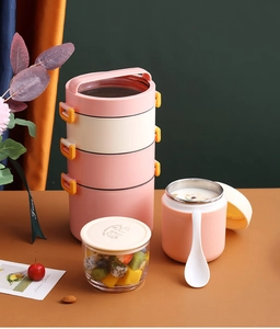 Détail du bol à soupe rose à double couche en acier inoxydable avec poignée portable