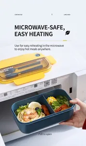 Microwave-safe 1100ml bento box with divided compartments, cutlery and fresh food