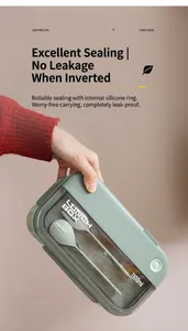 Detail of 1100ml green bento box showing leak-proof silicone seal and spoon
