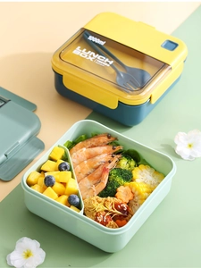 Detail of 1000ml layered bento box with separate compartments and built-in cutlery set