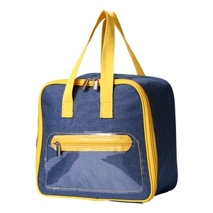 Insulated lunch bag in blue and yellow denim fabric with front transparent pocket