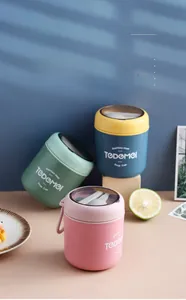 Detail of insulated stainless steel breakfast cups with portable handles and spoon storage