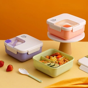 Close-up of the divided interior compartments and transparent cutlery storage lid