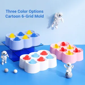 Space-themed silicone popsicle mold with astronaut handles and six-grid planet design
