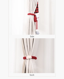 Side and back view of a Christmas gnome curtain buckle with red plaid hat and plush strap
