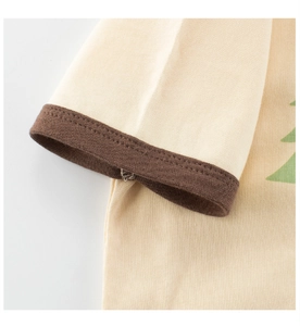 Detail of cotton T-shirt sleeve with brown ribbed edge and neat double-needle stitching