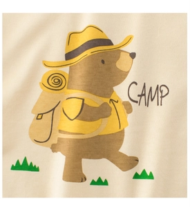 Detail of cartoon camping bear print on beige cotton t-shirt with soft fabric texture