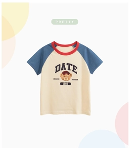 Detail of cotton raglan sleeve t-shirt with cartoon bear print and ribbed red neckline