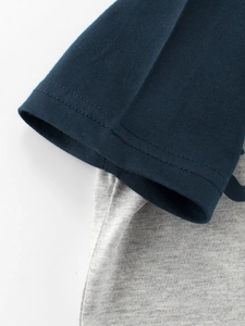 Kids short sleeve t-shirt with navy blue sleeves and grey cotton knit body details