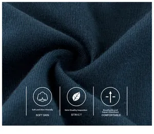 Close-up of dark blue knit fabric showing soft texture and breathable cotton weave