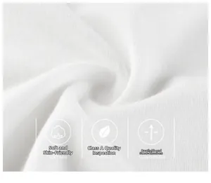Close-up of premium white Class A cotton fabric showing soft texture and fine knit fibers