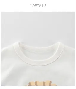 Close-up of the double-stitched crew neck and soft cotton fabric of a white kids' T-shirt