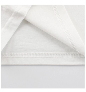 Detailed close-up showing the double-stitched hem and soft cotton fabric of the white t-shirt