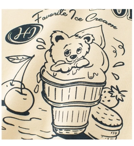 Close-up of retro ice cream bear illustration on beige knit cotton kids T-shirt