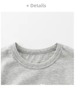 Close-up of grey cotton T-shirt ribbed crew neck with durable double-needle stitching