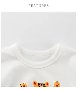 Detailed view of white cotton ribbed crew neck and vibrant tiger print for kids