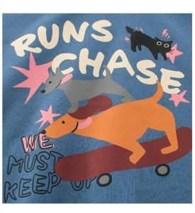 Close-up of blue cotton kids T-shirt with cute skateboarding dog and cat cartoon print