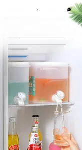Detailed macro view of 5.0L cold water kettle with spigot dispenser inside a refrigerator