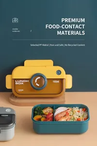 Detail of 1100ml camera style lunch box showing internal compartments with rice and shrimp
