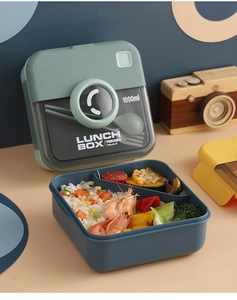 Detail of 1000ml bento lunch box showing inner compartments and cutlery storage in the lid