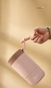 Detail view of pink breakfast cup with soft silicone handle for easy carrying