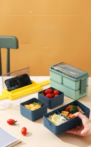Double-layer lunch box with phone stand lid, 1400ml capacity and partitioned compartments