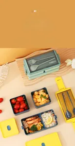 Double-layer stackable lunch box with 1400ml capacity and built-in utensil storage