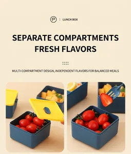 Detail of multi-compartment lunch box with fresh fruit showing leak-proof separation