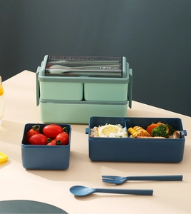 Detail of 1400ml double-layer mint green lunch box with built-in cutlery and seal lid